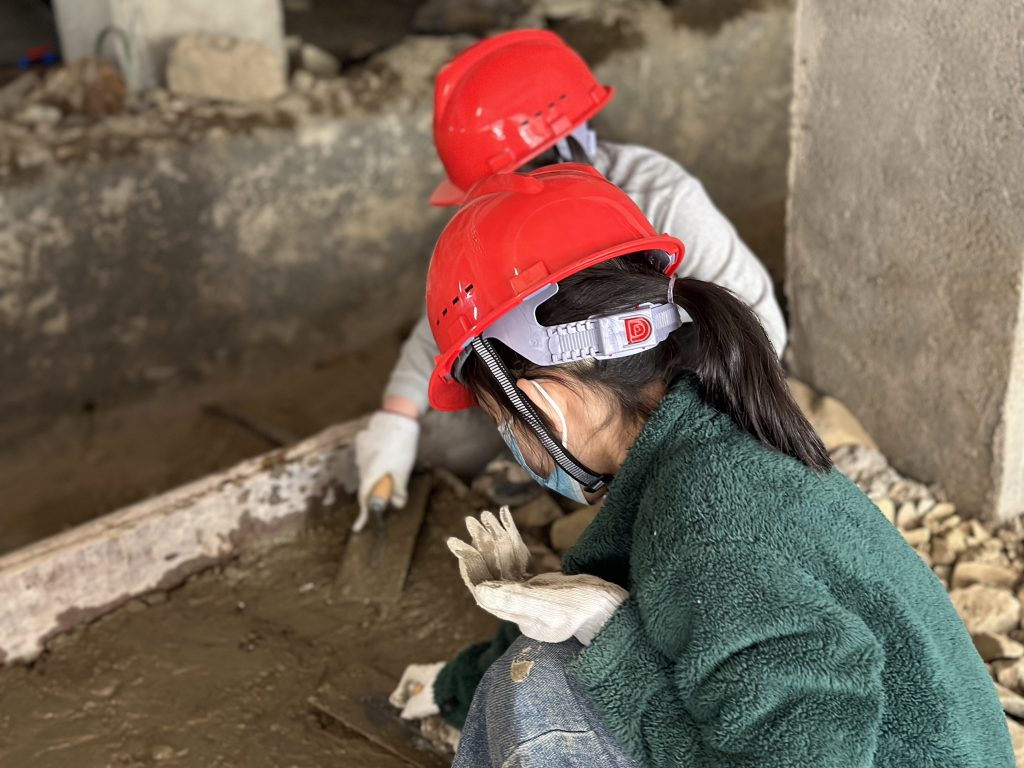 Students working on a village restoration project in Huangshan