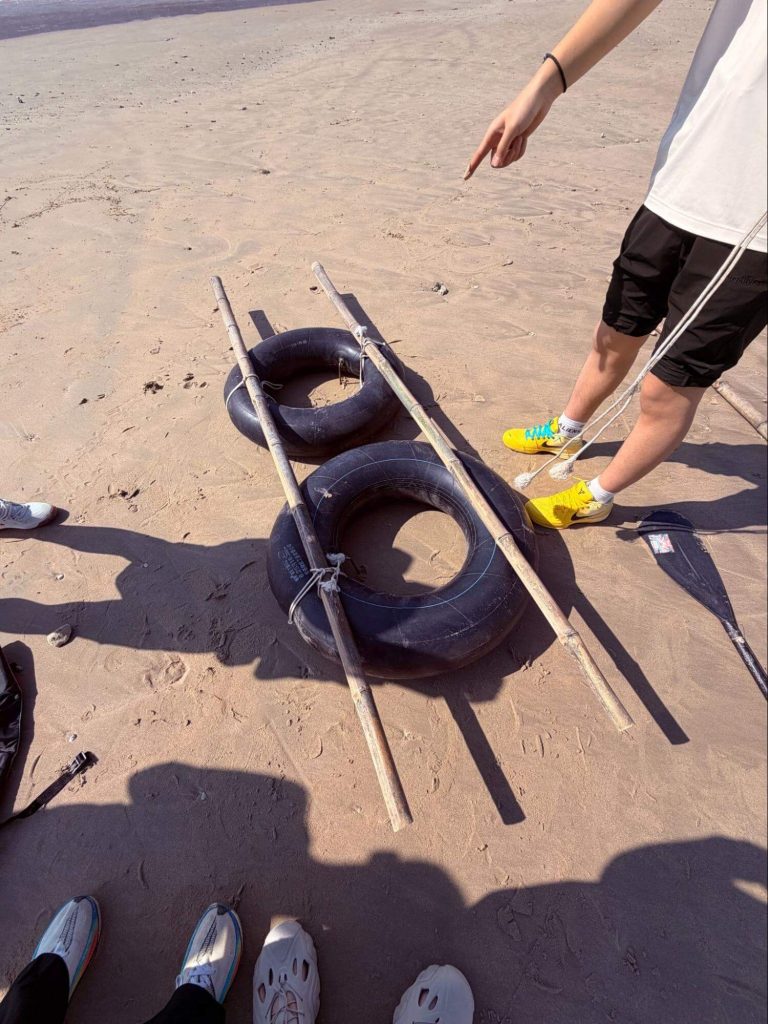 Students participating in beach activities